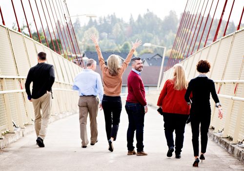 Syte Consulting Group Team Photo on a Bridge